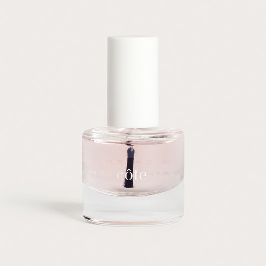 Côte Beauty Nail Strengthener Base Coat Non-Toxic Nail Treatment Primer in a bottle.
